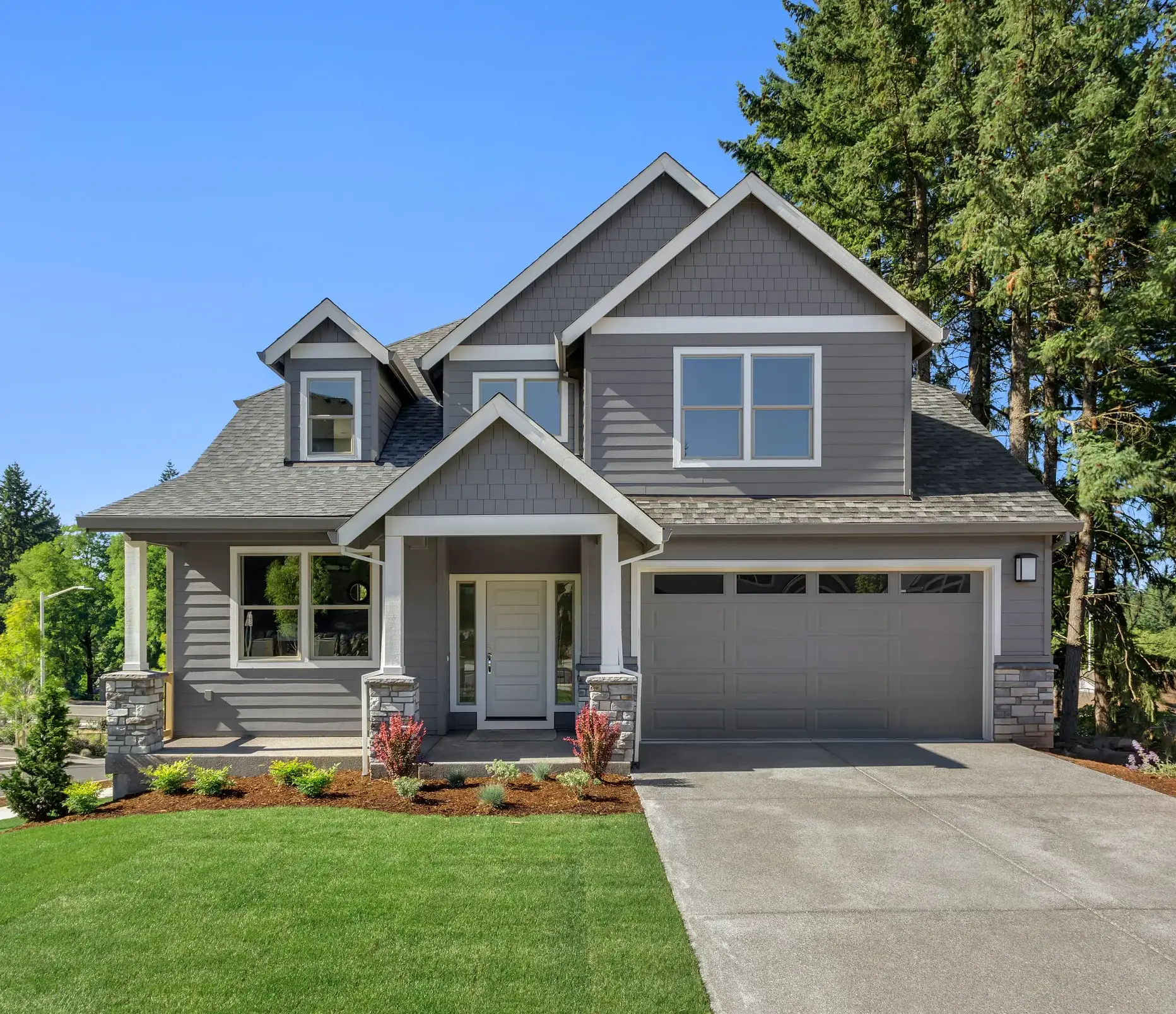 Home exterior painted gray with white trim
